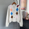 Contrasting diamond patterned sweater